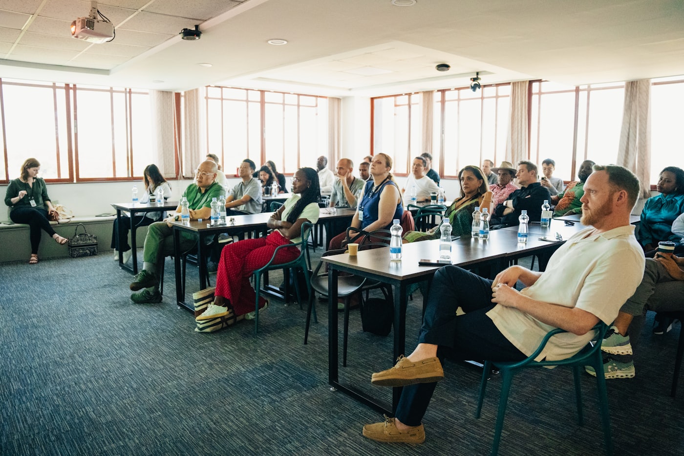 Adults seated in a professional learning session.